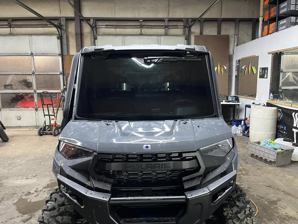 Side by side UTV with custom tint work